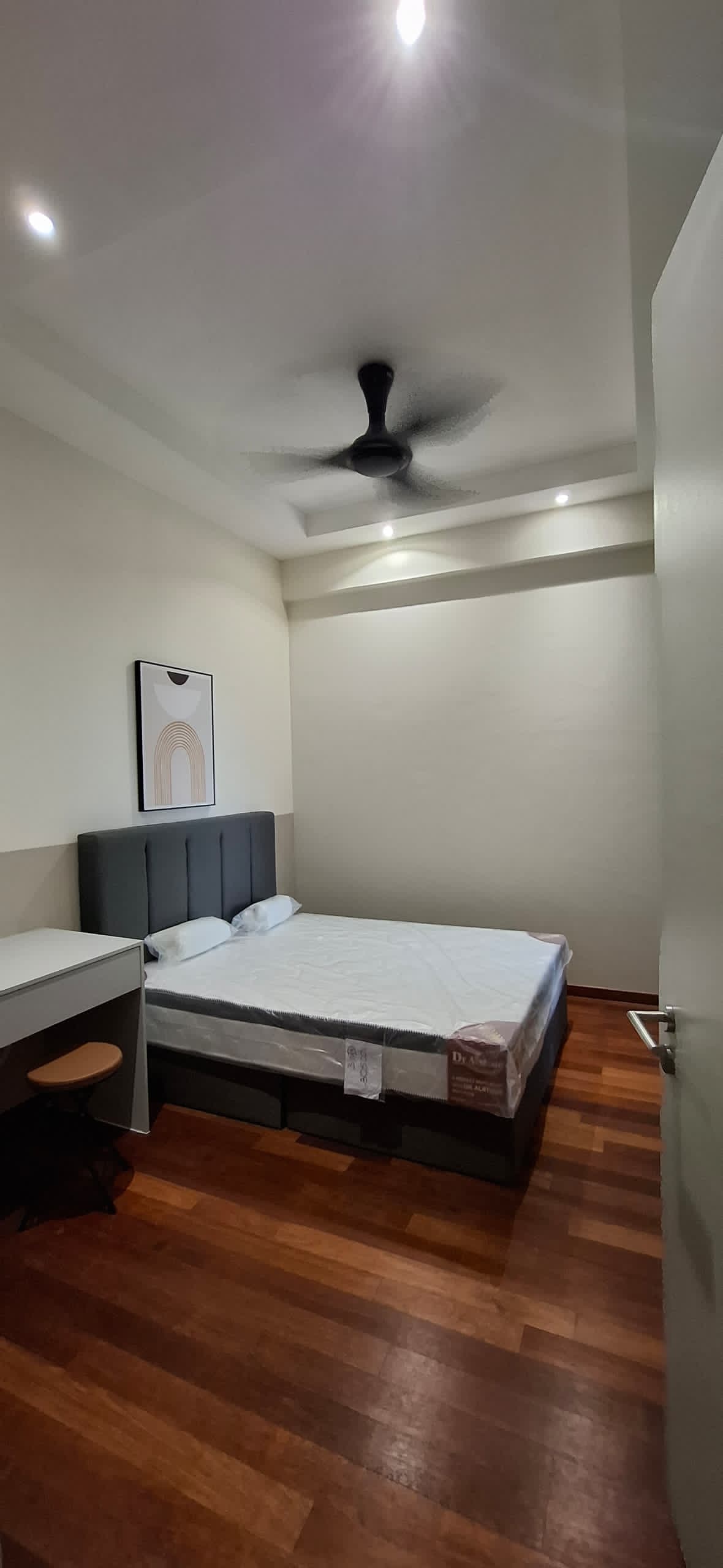 Bedroom renovation — tray ceiling, wooden flooring, pendant light